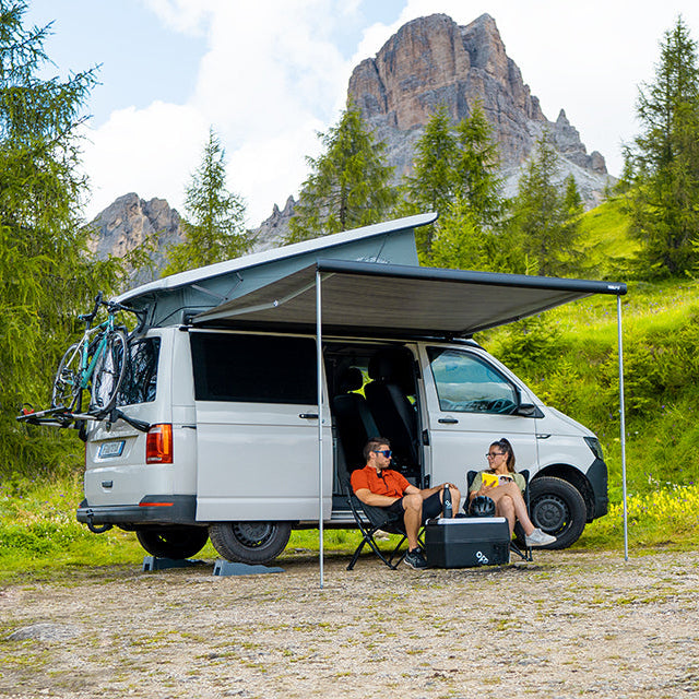 Fiamma F43van 3.0 meter wall-mounted manual awning with deep black aluminum case and royal grey vinyl canopy installed on a campervan.