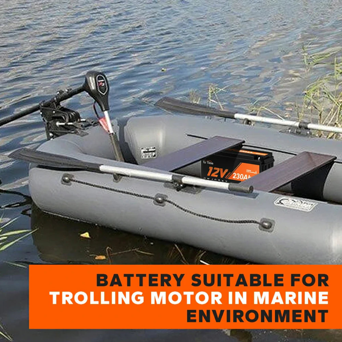 Inflatable boat with trolling motor and battery on water