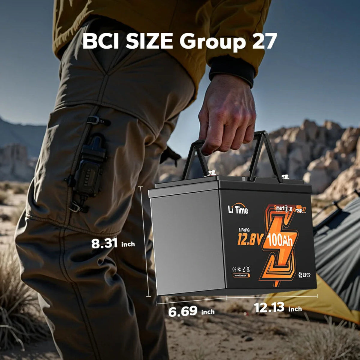 Person holding a battery with dimensions of the BCI Size Group 27.