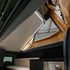 Interior of a Ford E-Series with a Cloud Cap Bed