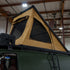 Roof top tent attached to a Ford E-Series campervan