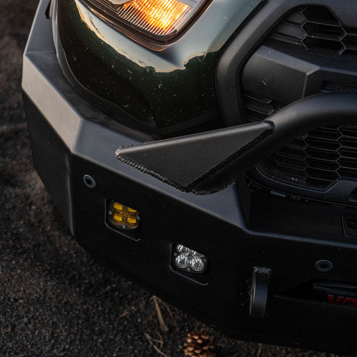 Close-up of aluminum welds and light cutouts on Aluminess front bumper