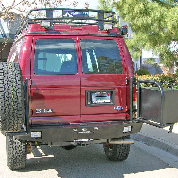 Aluminess rear bumper installed on a Ford E-Series van for off-road and overland use