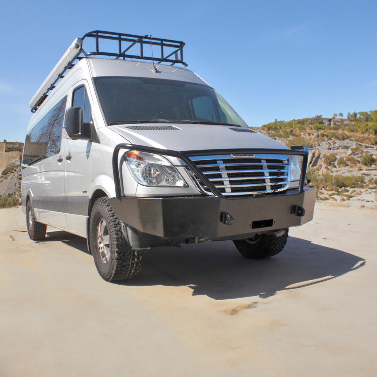 Three-quarter view showing front bumper fitment on Sprinter