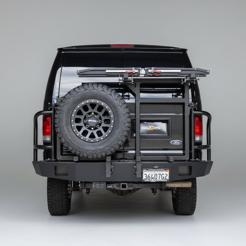 Rear view of Aluminess rear bumper installed on a Ford E-Series van