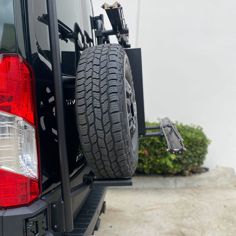 Rear door–mounted spare tire carrier detail on Ford Transit