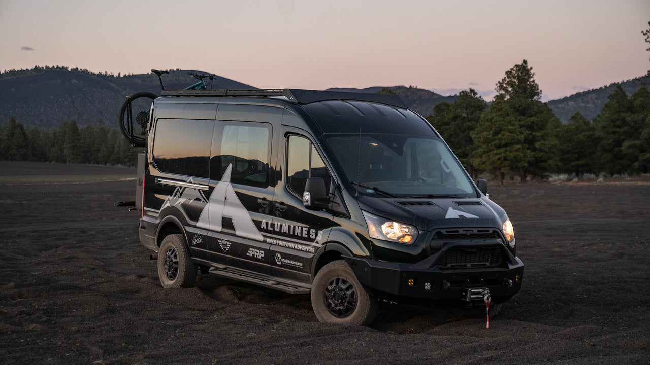 Ford Transit van equipped with Aluminess front bumper for recovery and overlanding