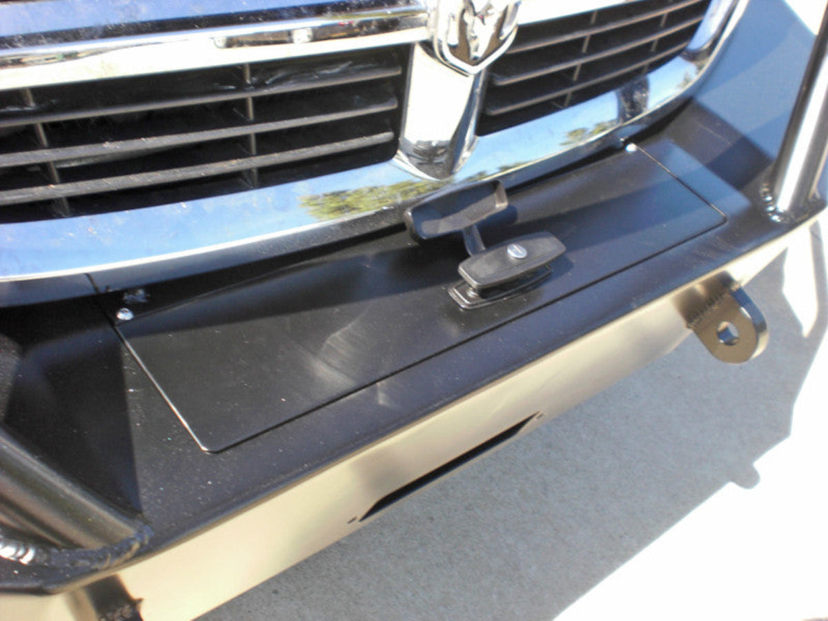 Center section of Sprinter front bumper showing toolbox, winch opening and recovery points