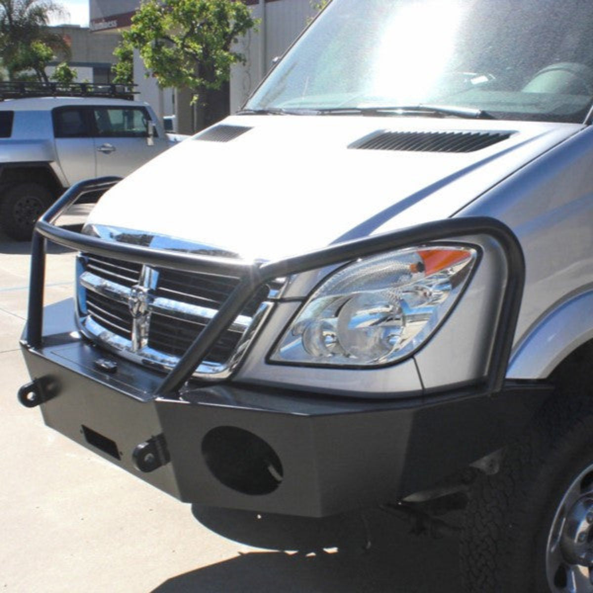 Side angle showing aluminum bumper integration on Sprinter