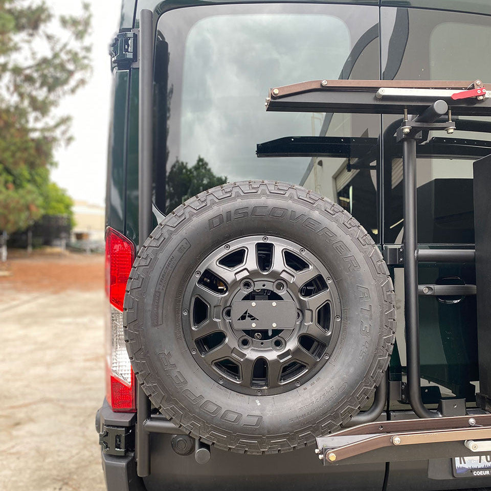 Spare tire rack mounted on Aluminess rear door system for Transit